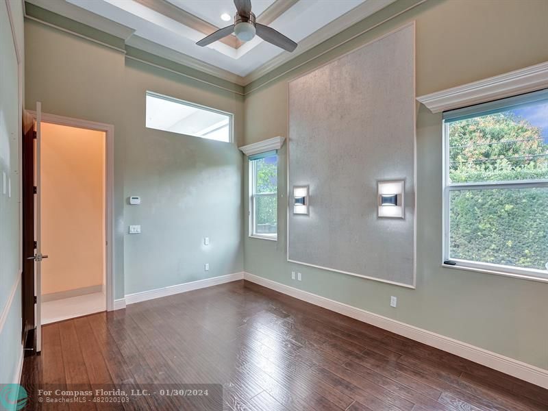 1965 Park Place Boca Raton, FL 33486 - Photo 16 of 30 an empty room with wooden floor and windows