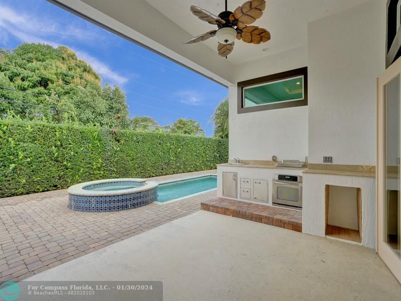 1965 Park Place Boca Raton, FL 33486 - Photo 21 of 30 a white stove top oven sitting inside of a kitchen