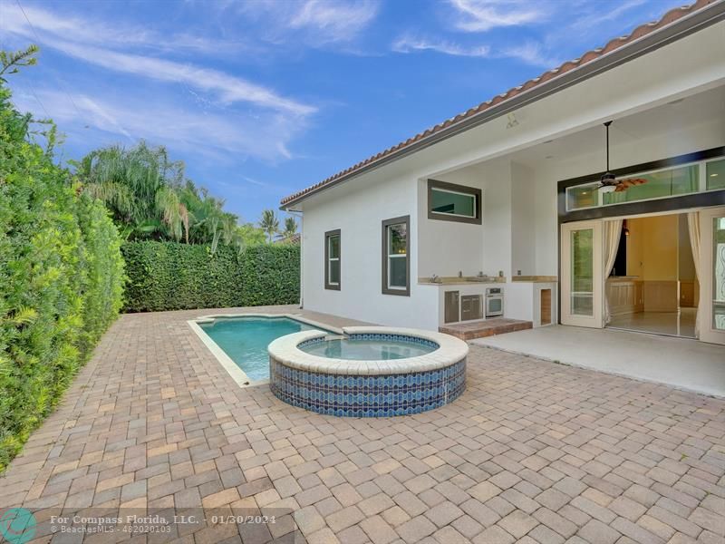 1965 Park Place Boca Raton, FL 33486 - Photo 23 of 30 a view of a house with backyard and a garden