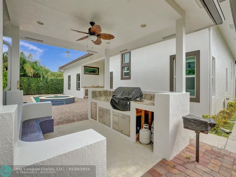 1965 Park Place Boca Raton, FL 33486 - Photo 25 of 30 a living room with furniture a window and appliances