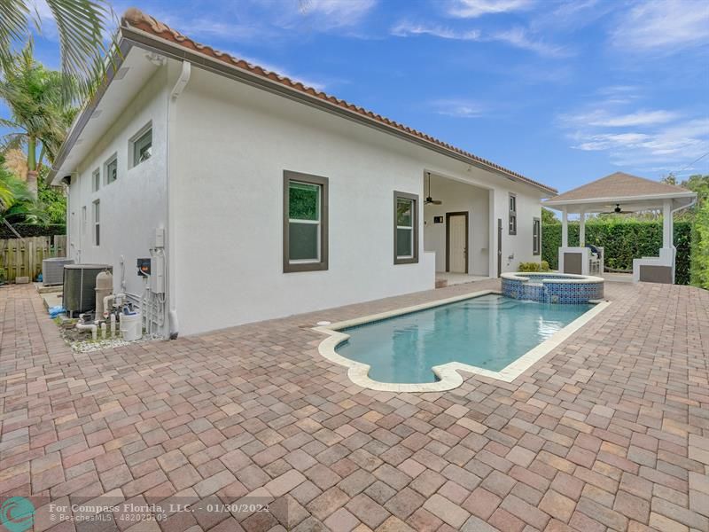 1965 Park Place Boca Raton, FL 33486 - Photo 26 of 30 a view of a house with backyard and sitting area