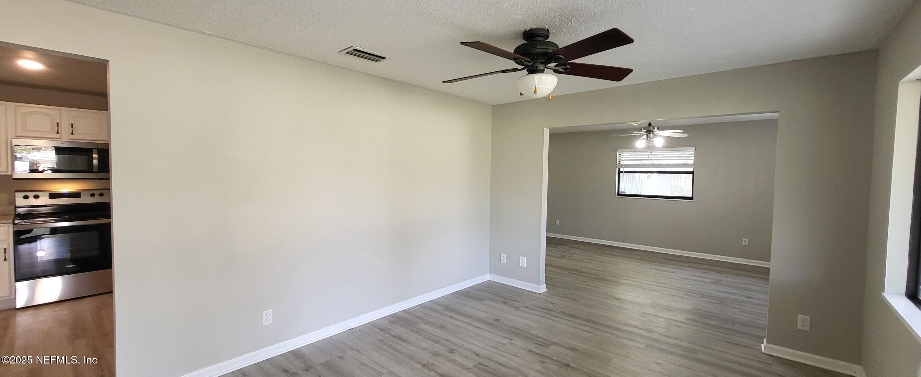 8166 Paschal Street Jacksonville, FL 32220 - Photo 4 of 10 2 Living Room B