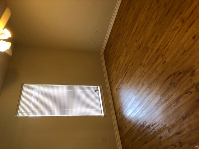 908 Willow Pond Street College Station, TX 77845 - Photo 5 of 7 a view of an empty room with wooden floor and a window