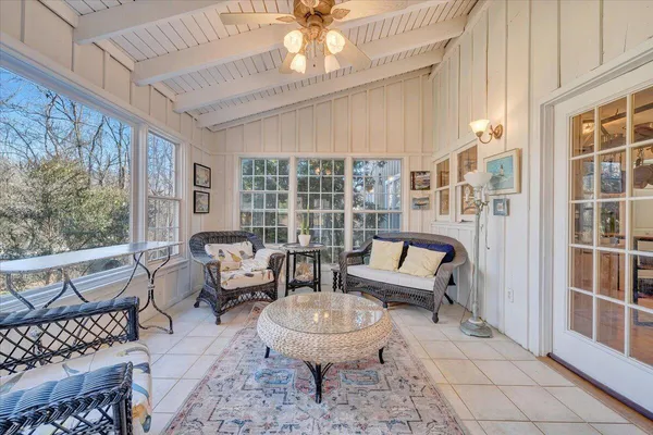 a kitchen with stainless steel appliances granite countertop a refrigerator a stove and a sink