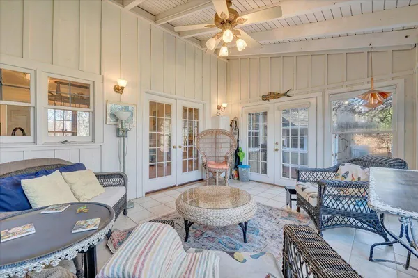 a kitchen with stainless steel appliances granite countertop a stove a sink dishwasher and cabinets with wooden floor