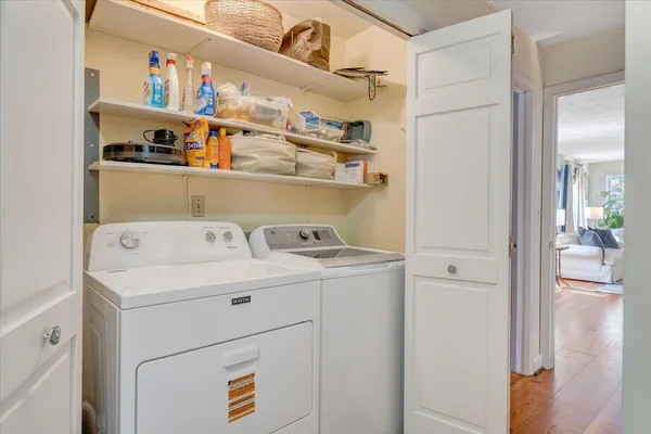 a view of a chairs and table in the patio