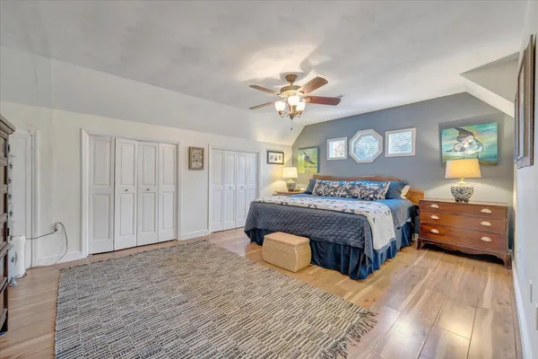 a view of a patio with chairs and a fire pit