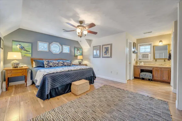 a view of a backyard with large trees