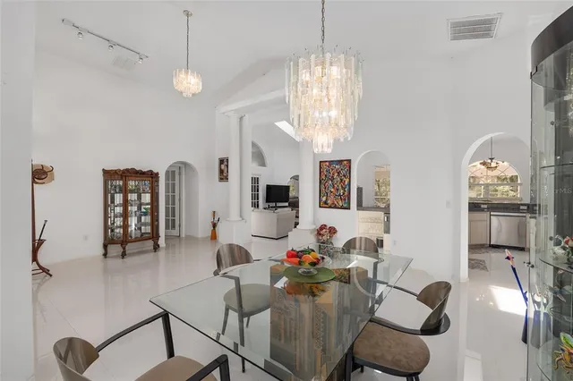 a view of walk in closet with clothes