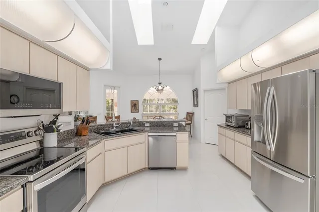 a view of a park with large trees