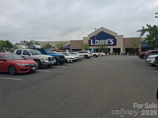 a view of a city street with cars