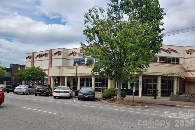 a view of a park with swings and slides