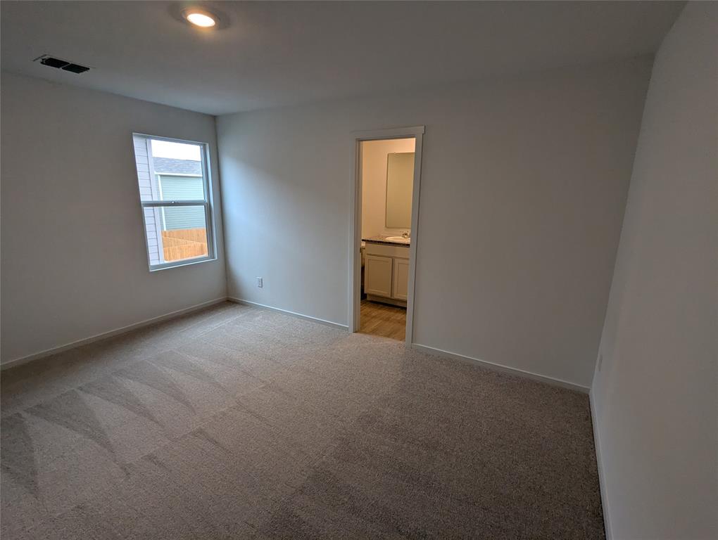 904 Wood Stork Way Princeton, TX 75407 - Photo 17 of 40 a view of empty room with windows