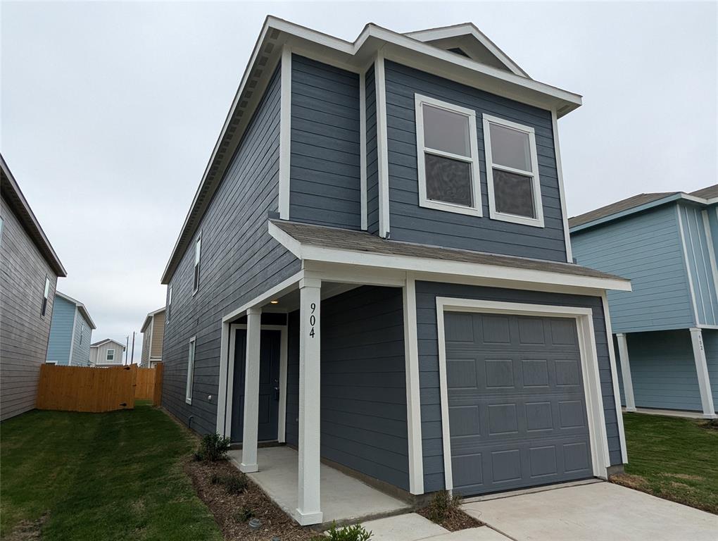 904 Wood Stork Way Princeton, TX 75407 - Photo 2 of 40 a front view of a house with garden