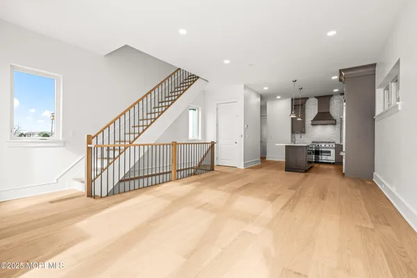 a view of a kitchen with furniture and a kitchen view