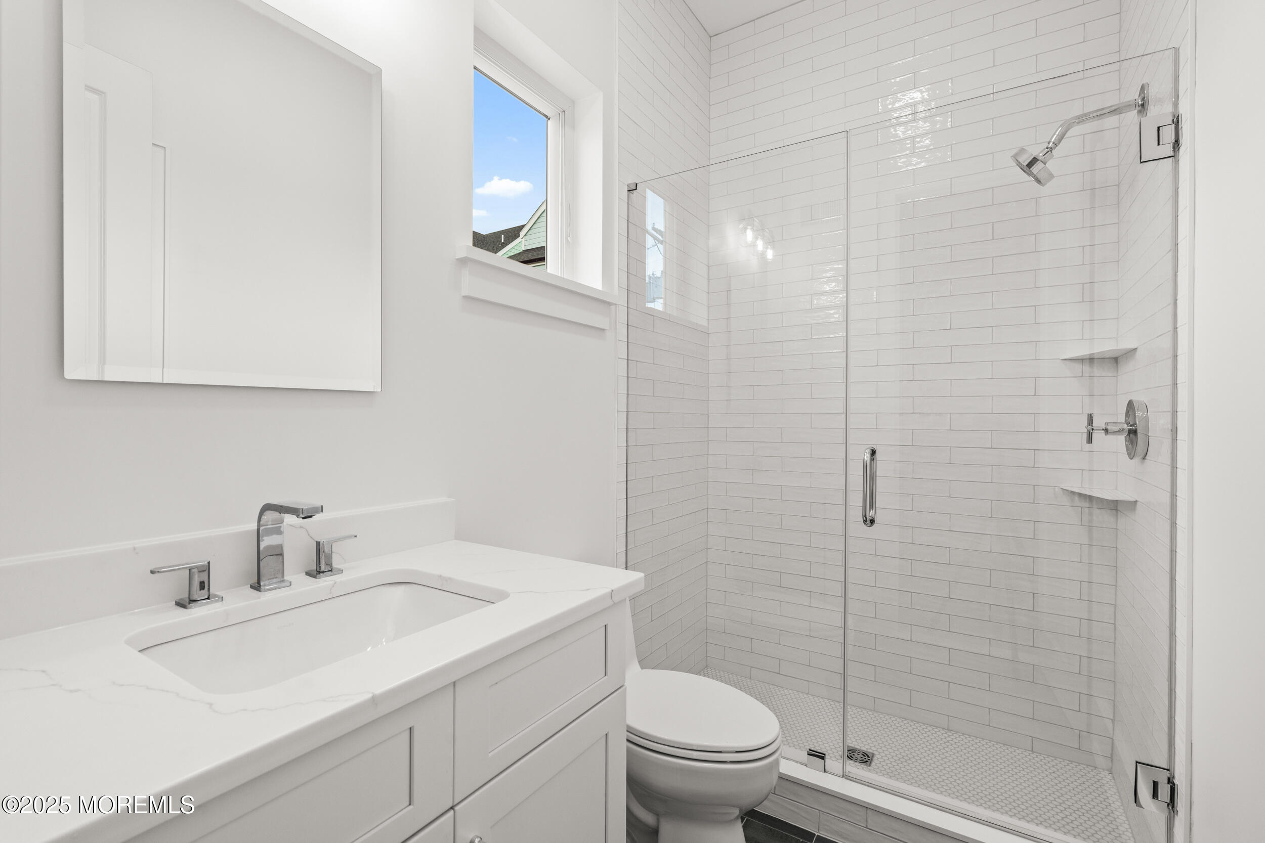 7 South Street Sea Bright, NJ 07760 - Photo 19 of 45 a bathroom with a sink toilet and shower