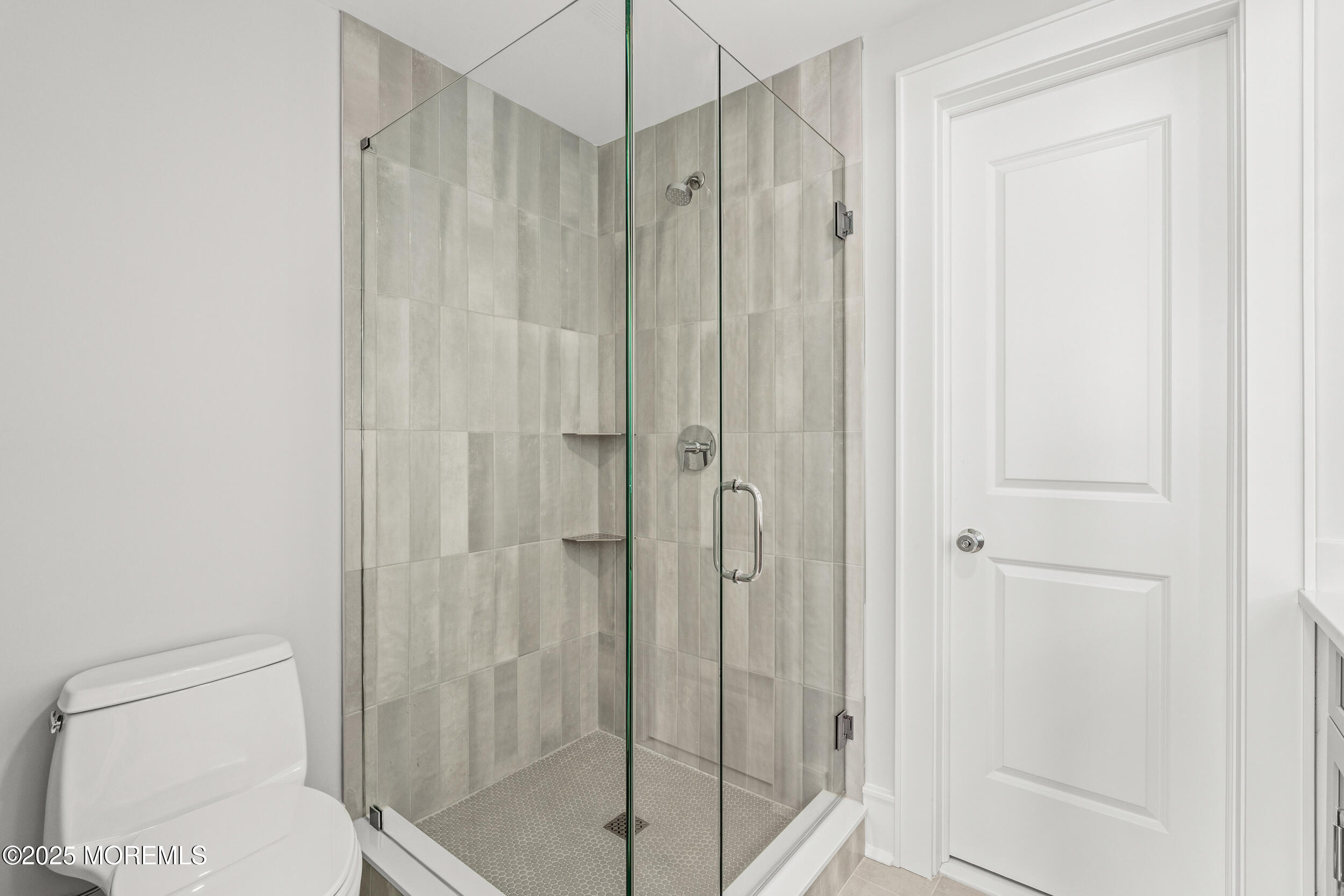 7 South Street Sea Bright, NJ 07760 - Photo 25 of 45 a bathroom with a shower and a toilet