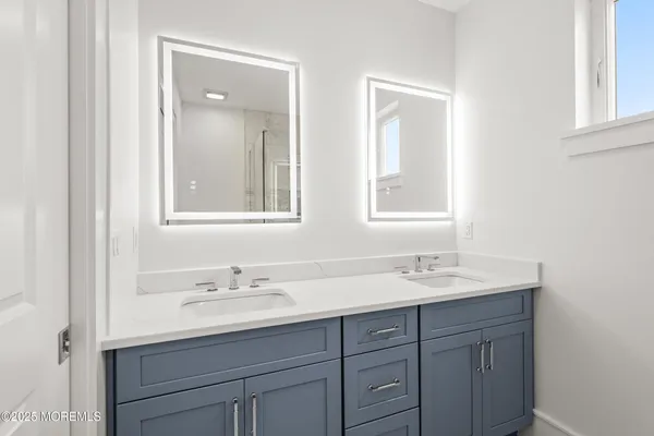 a bathroom with a shower and toilet