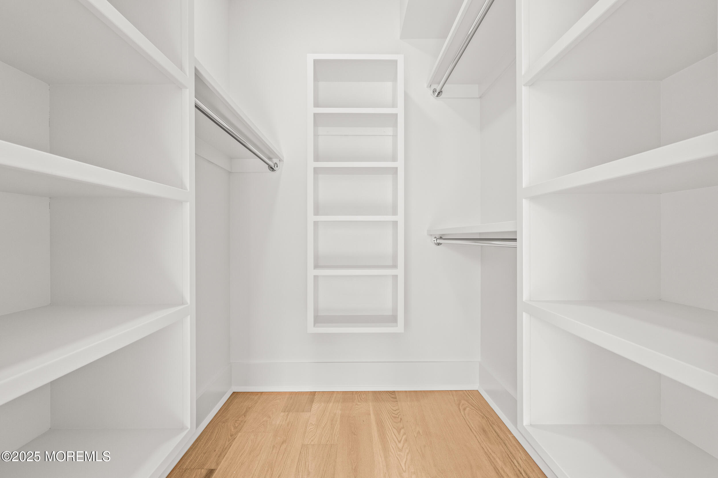 7 South Street Sea Bright, NJ 07760 - Photo 34 of 45 a view of walk in closet with empty racks