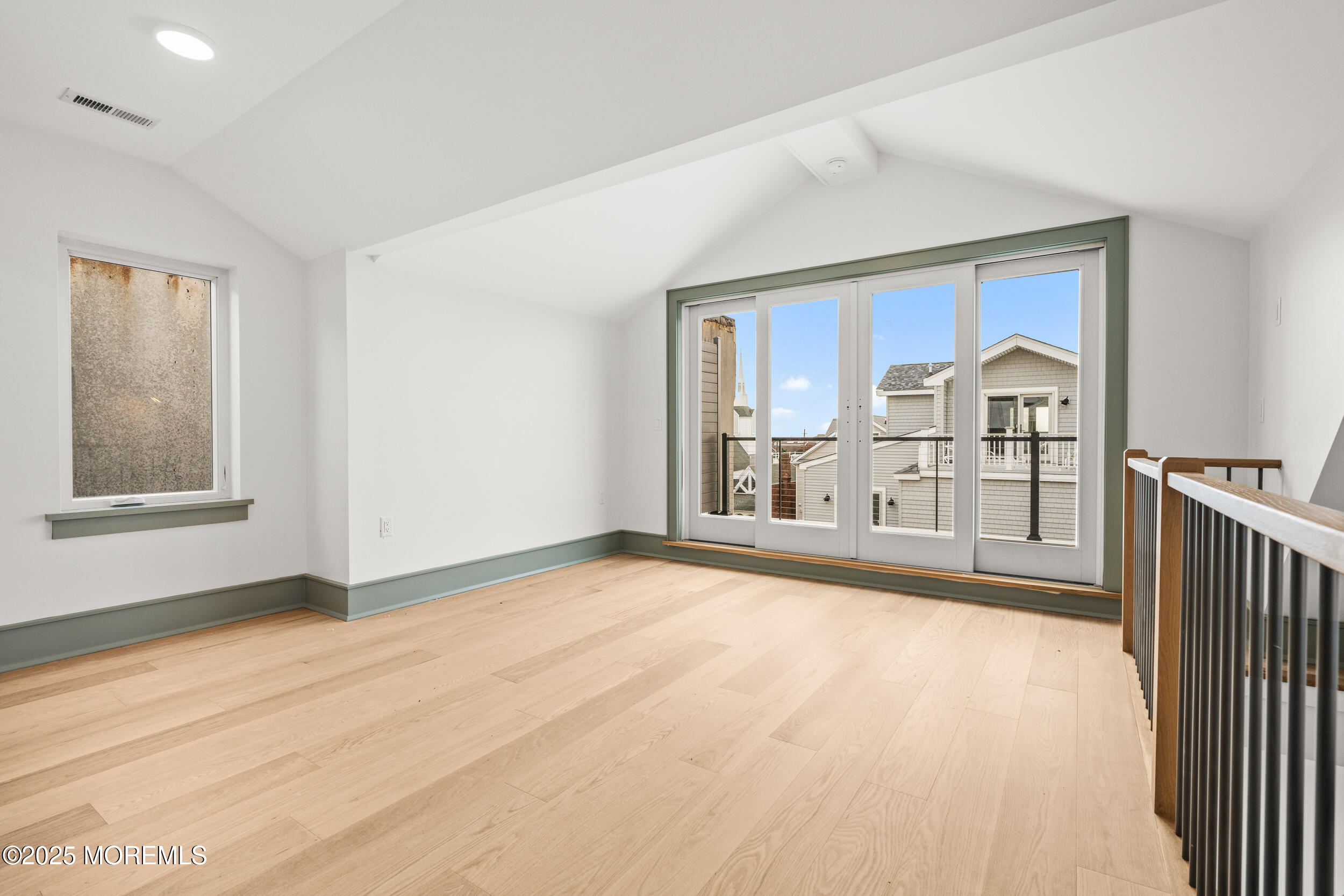 7 South Street Sea Bright, NJ 07760 - Photo 38 of 45 a view of a room with wooden floor and windows