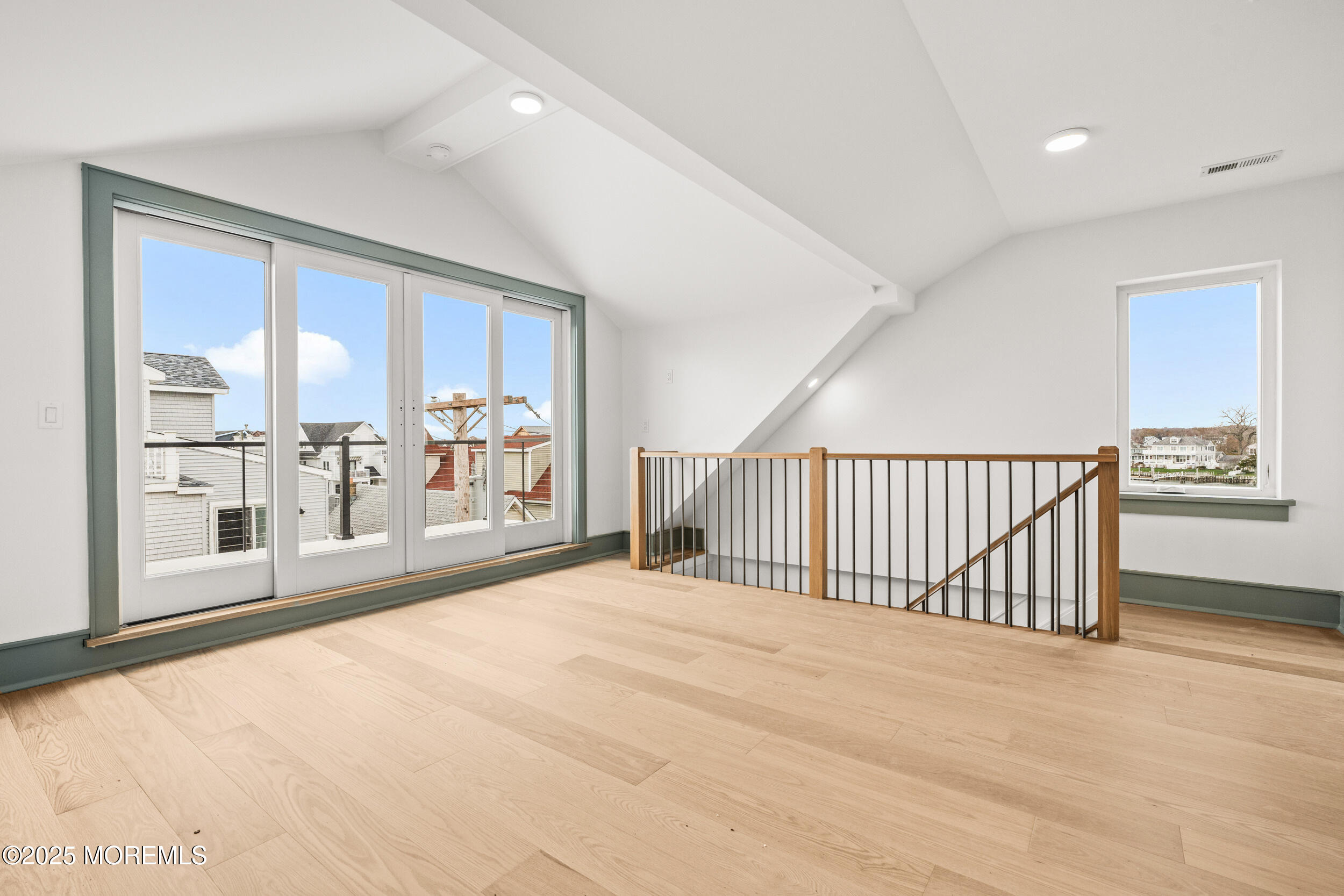 7 South Street Sea Bright, NJ 07760 - Photo 40 of 45 a view of a big room with windows and chandelier