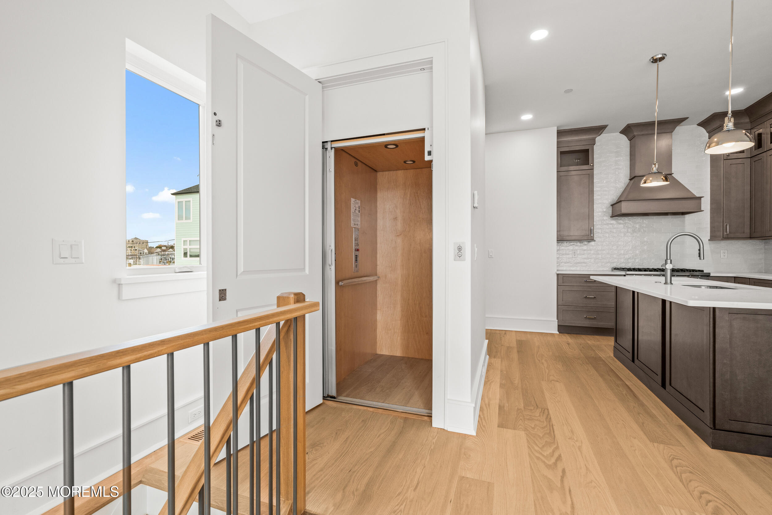 7 South Street Sea Bright, NJ 07760 - Photo 6 of 45 a view of a kitchen with a sink and a wooden floor