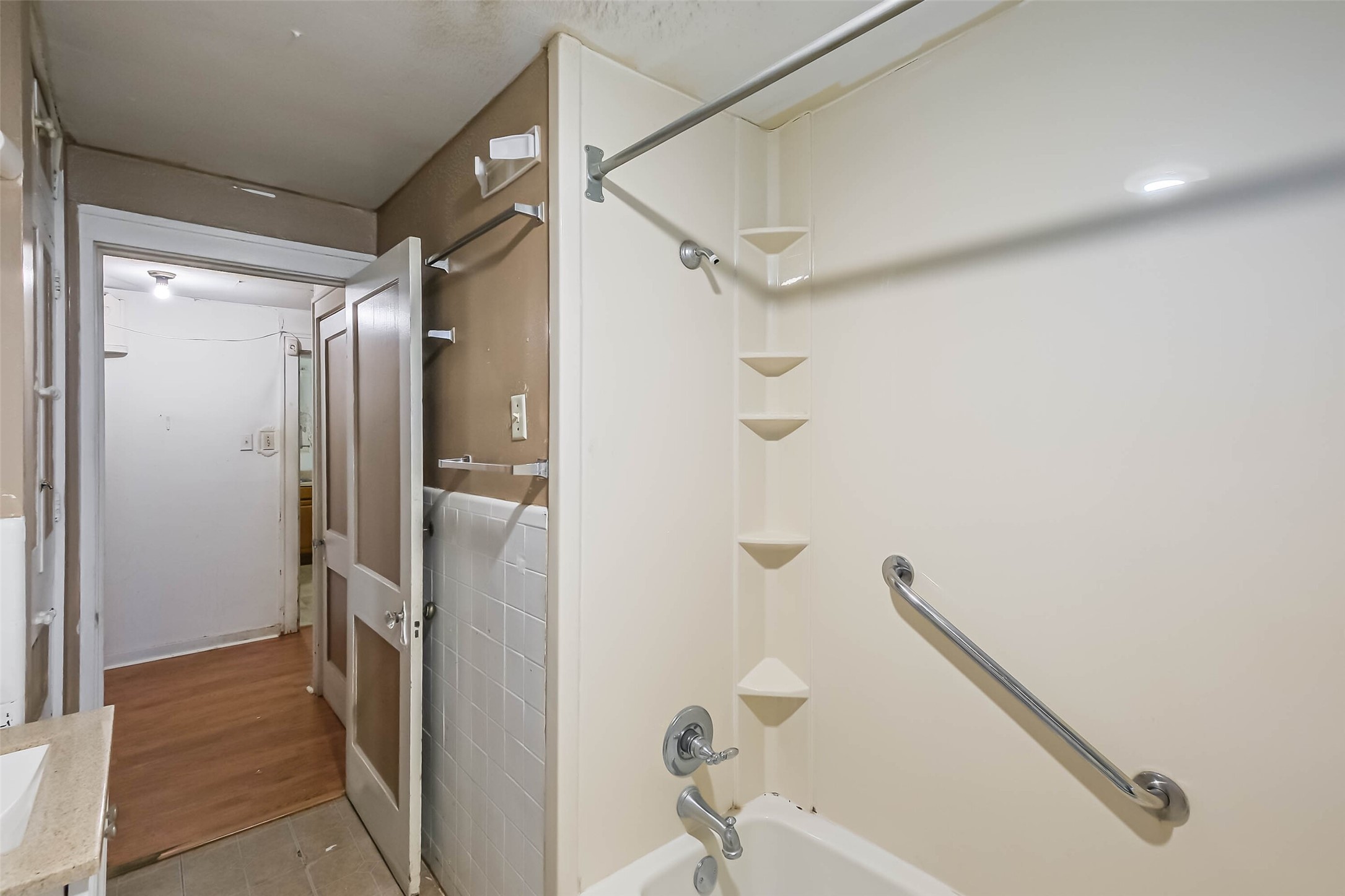2802 Wheeler Avenue Houston, TX 77004 - Photo 12 of 20 a bathroom with a shower and a glass door