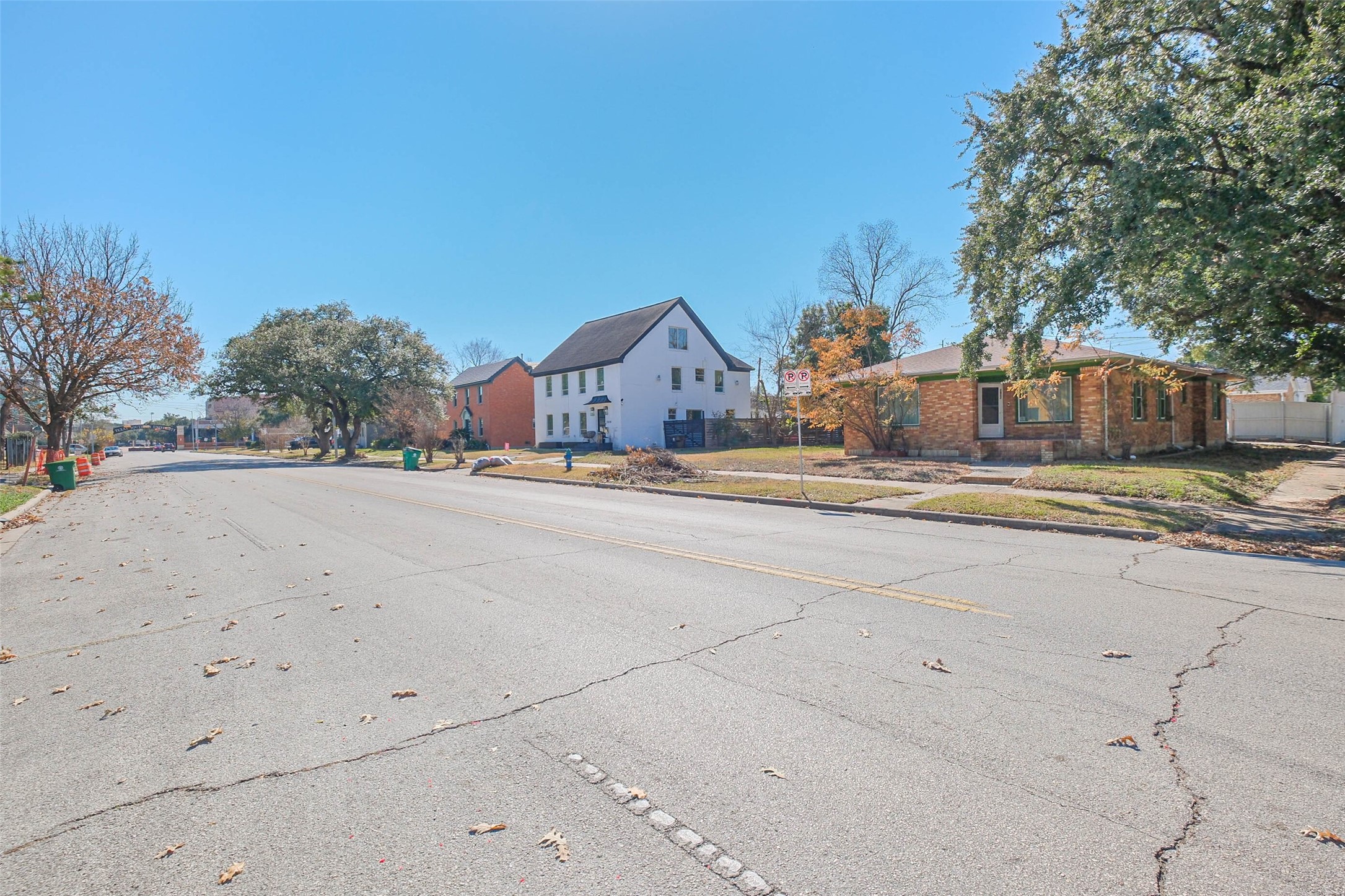 2802 Wheeler Avenue Houston, TX 77004 - Photo 17 of 20 a view of large house with a road and a building in the background