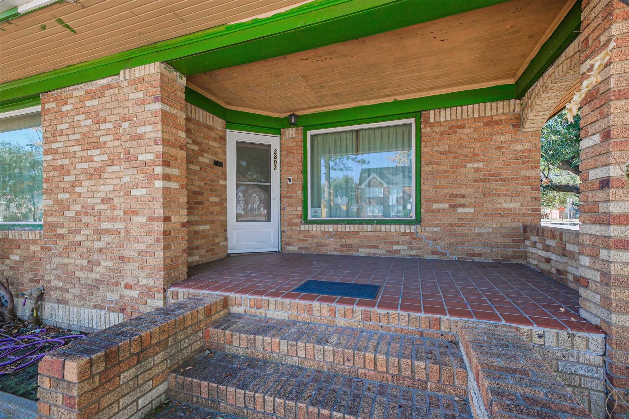 2802 Wheeler Avenue Houston, TX 77004 - Photo 3 of 20 a view of front door of house with stairs