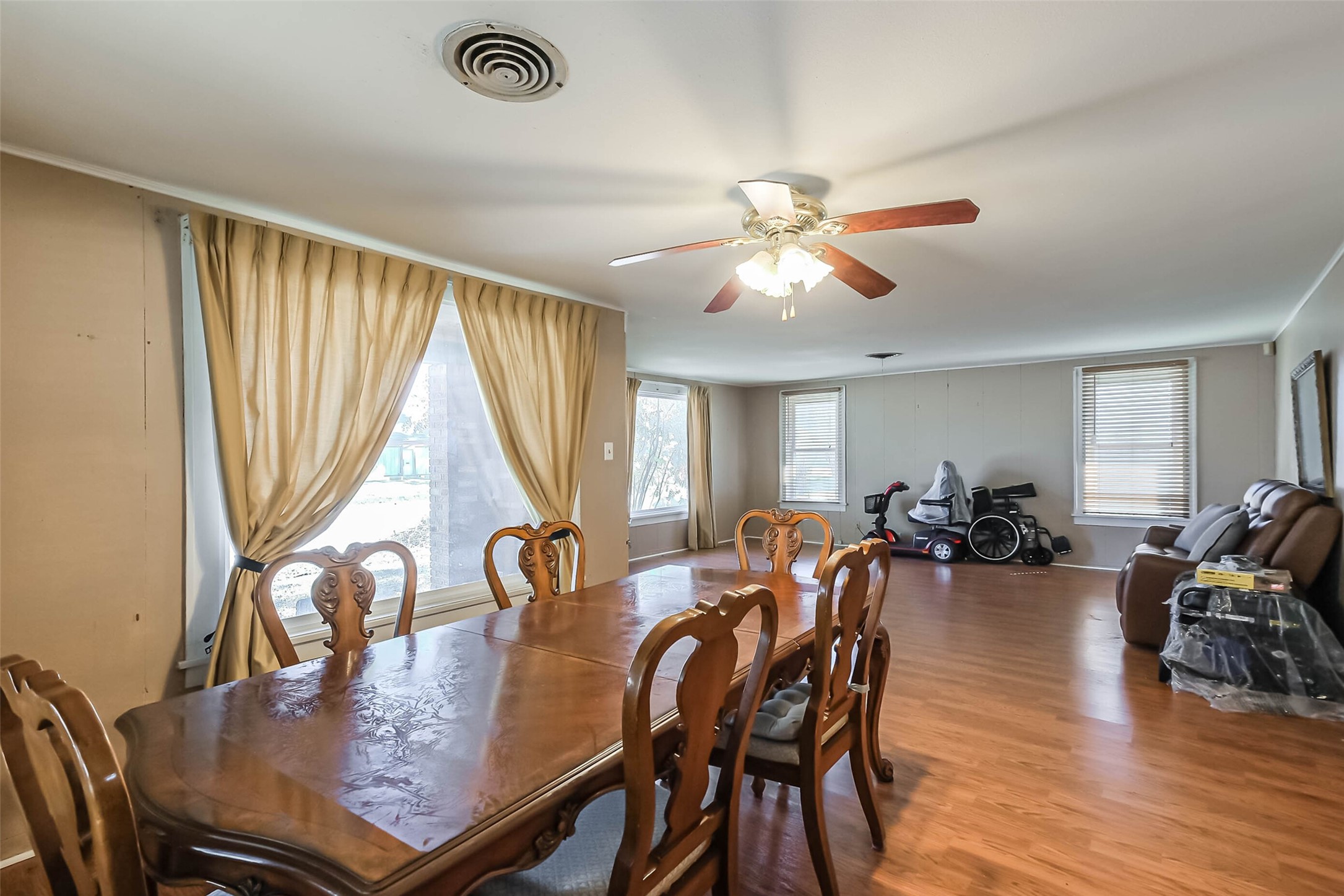 2802 Wheeler Avenue Houston, TX 77004 - Photo 6 of 20 a view of a dining room with furniture window and wooden floor