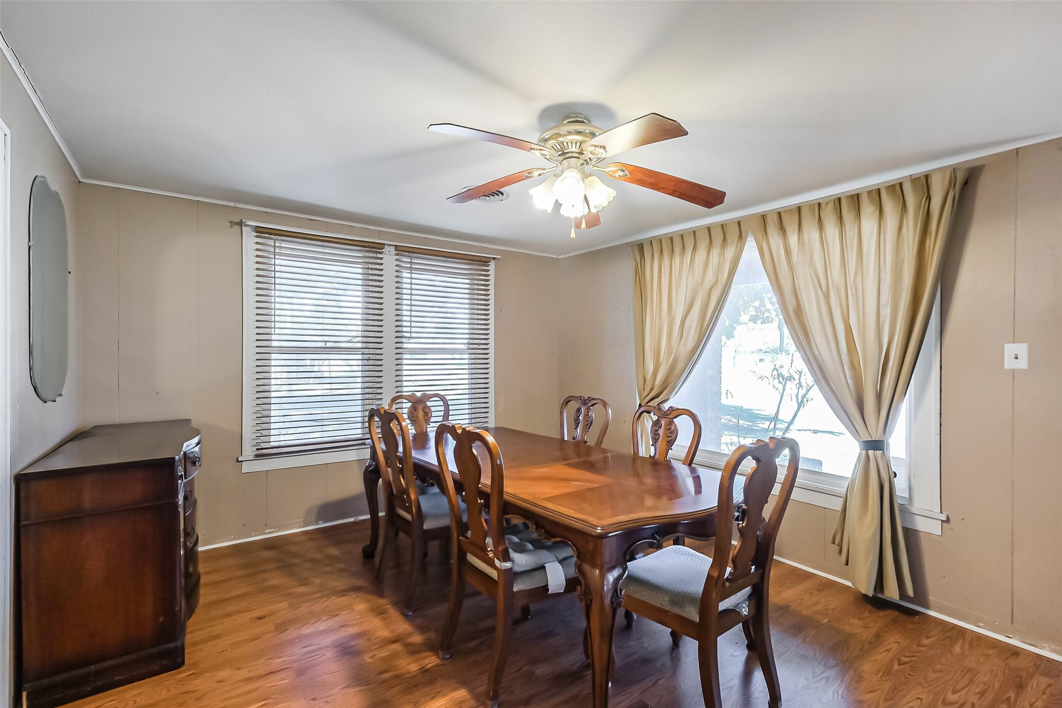 2802 Wheeler Avenue Houston, TX 77004 - Photo 7 of 20 a view of a dining room with furniture window and wooden floor