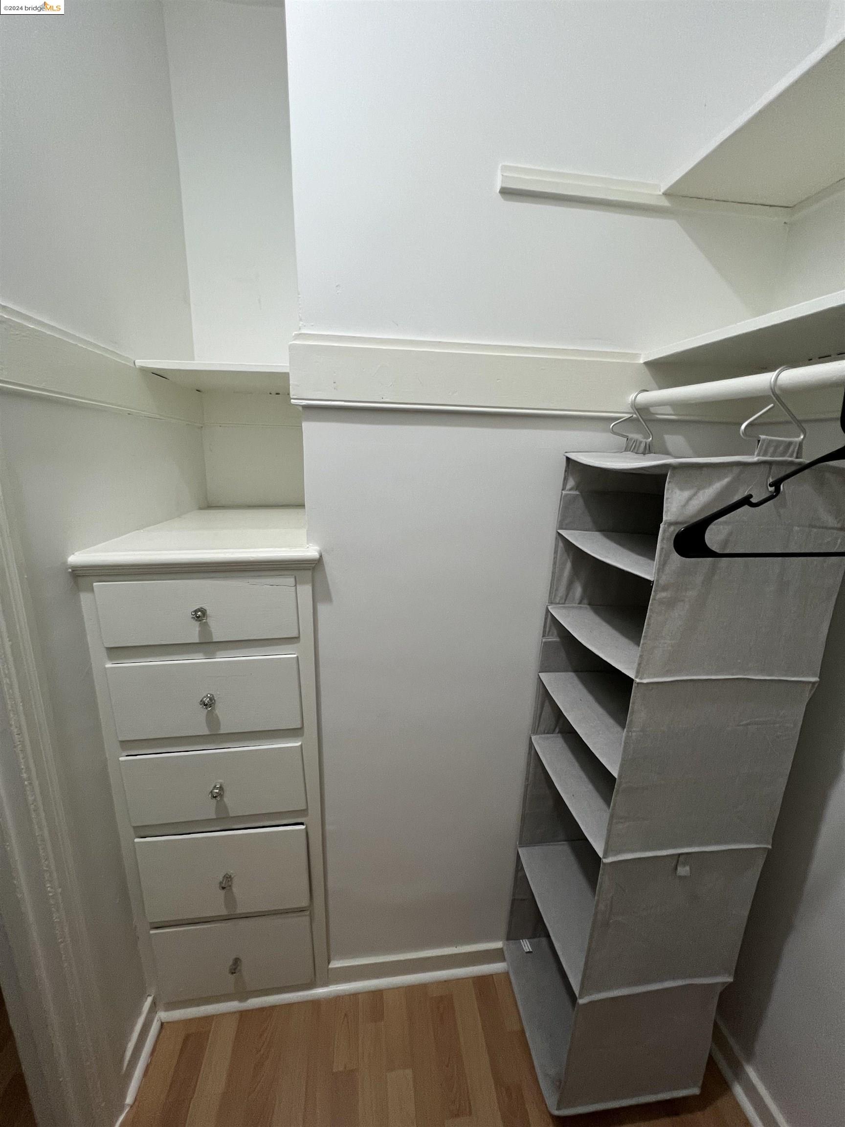 1846 Spruce Street, Unit 4 Berkeley, CA 94709 - Photo 6 of 6 a view of walk in closet with empty racks