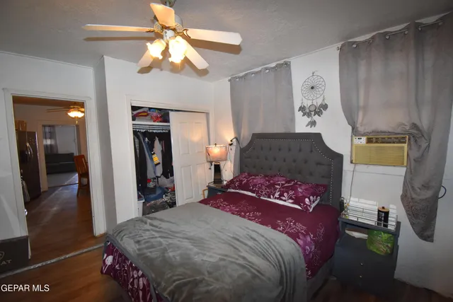 a bathroom with a sink vanity mirror and toilet