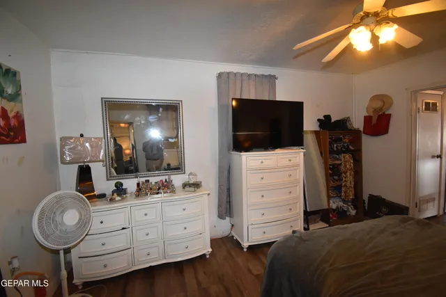 a kitchen that has a sink and a stove top oven