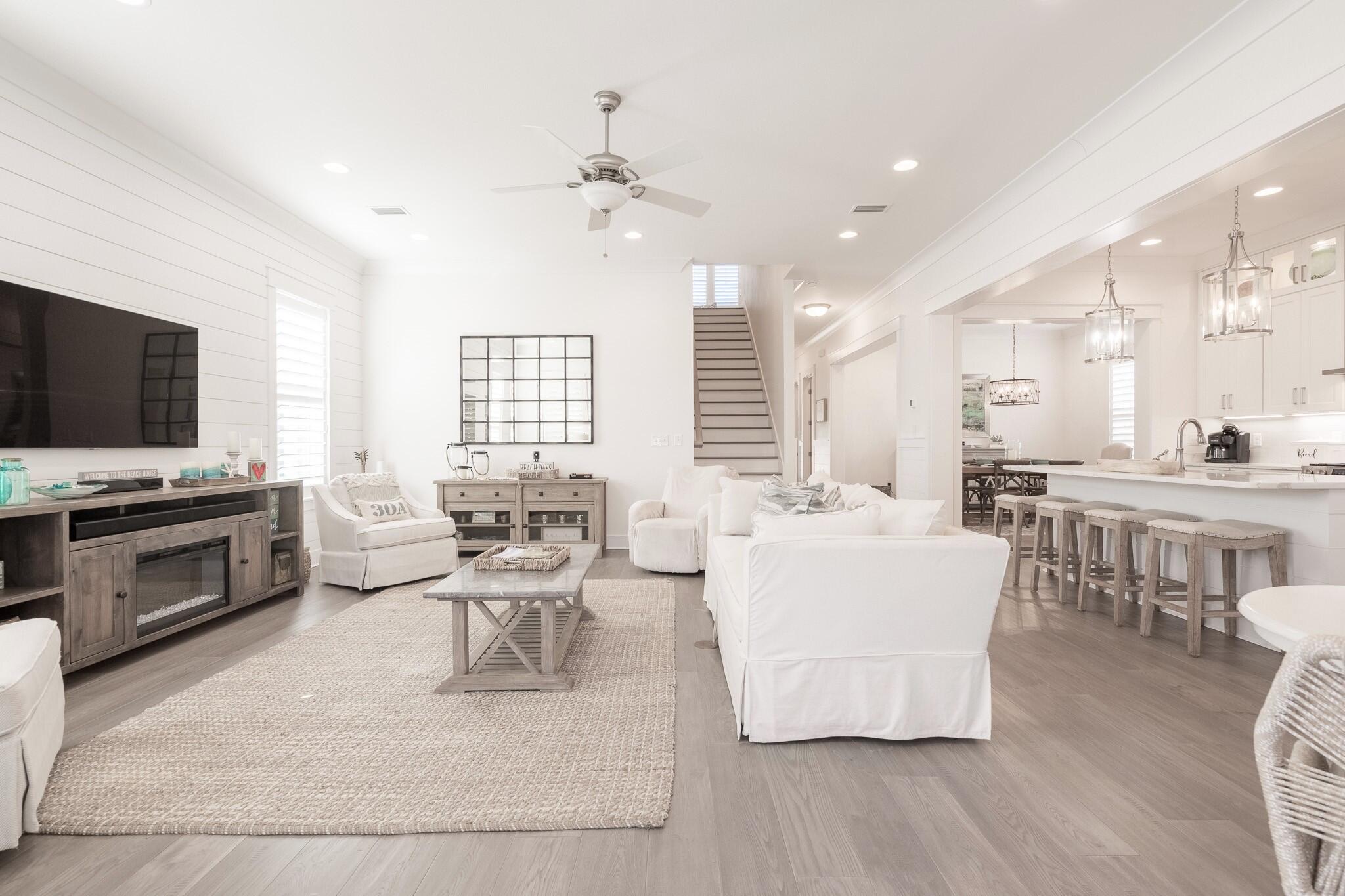 229 Sandchase Circle Inlet Beach, FL 32461 - Photo 16 of 61 a living room with furniture and a flat screen tv