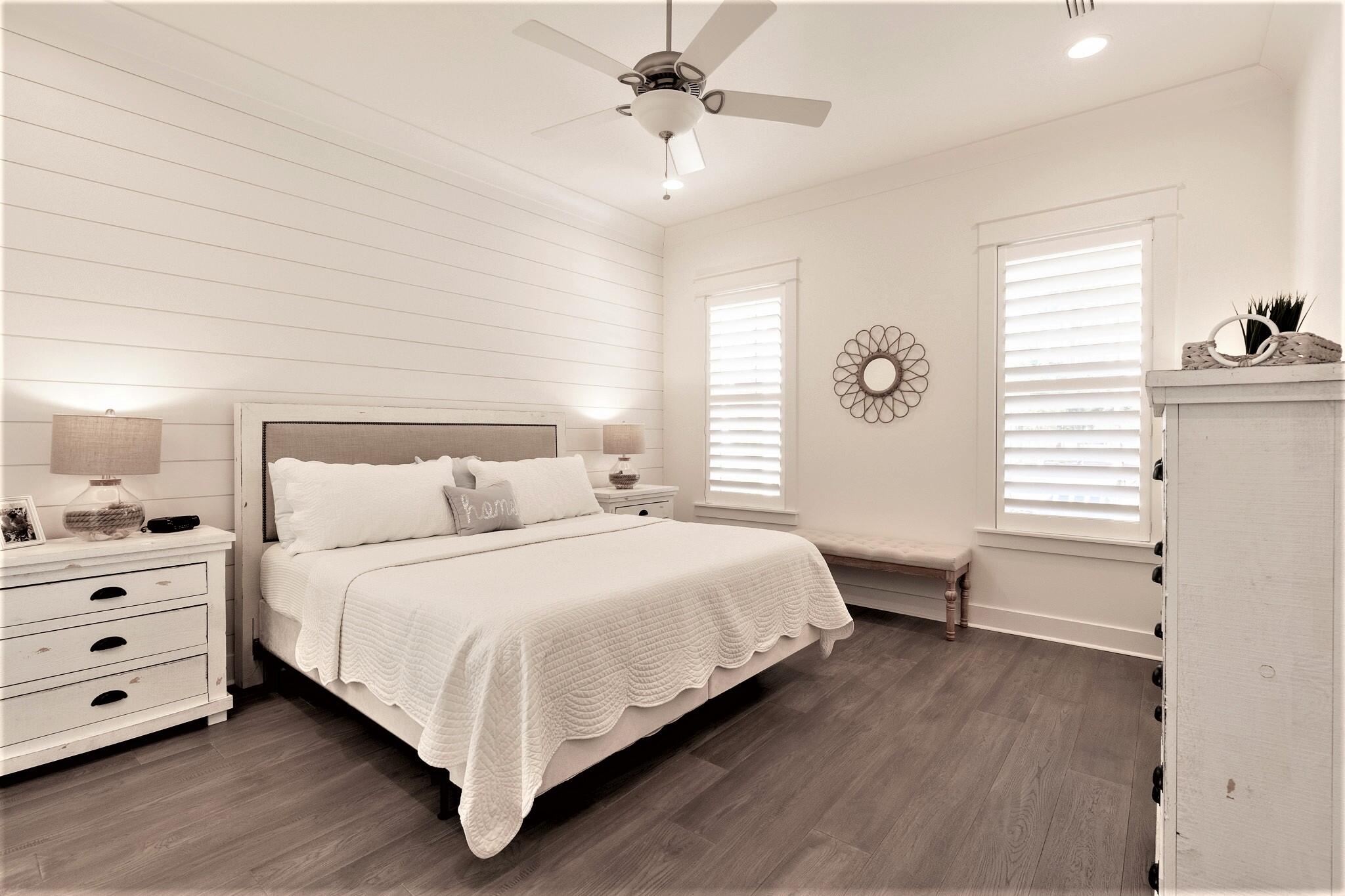 229 Sandchase Circle Inlet Beach, FL 32461 - Photo 19 of 61 a bedroom with a bed and a window