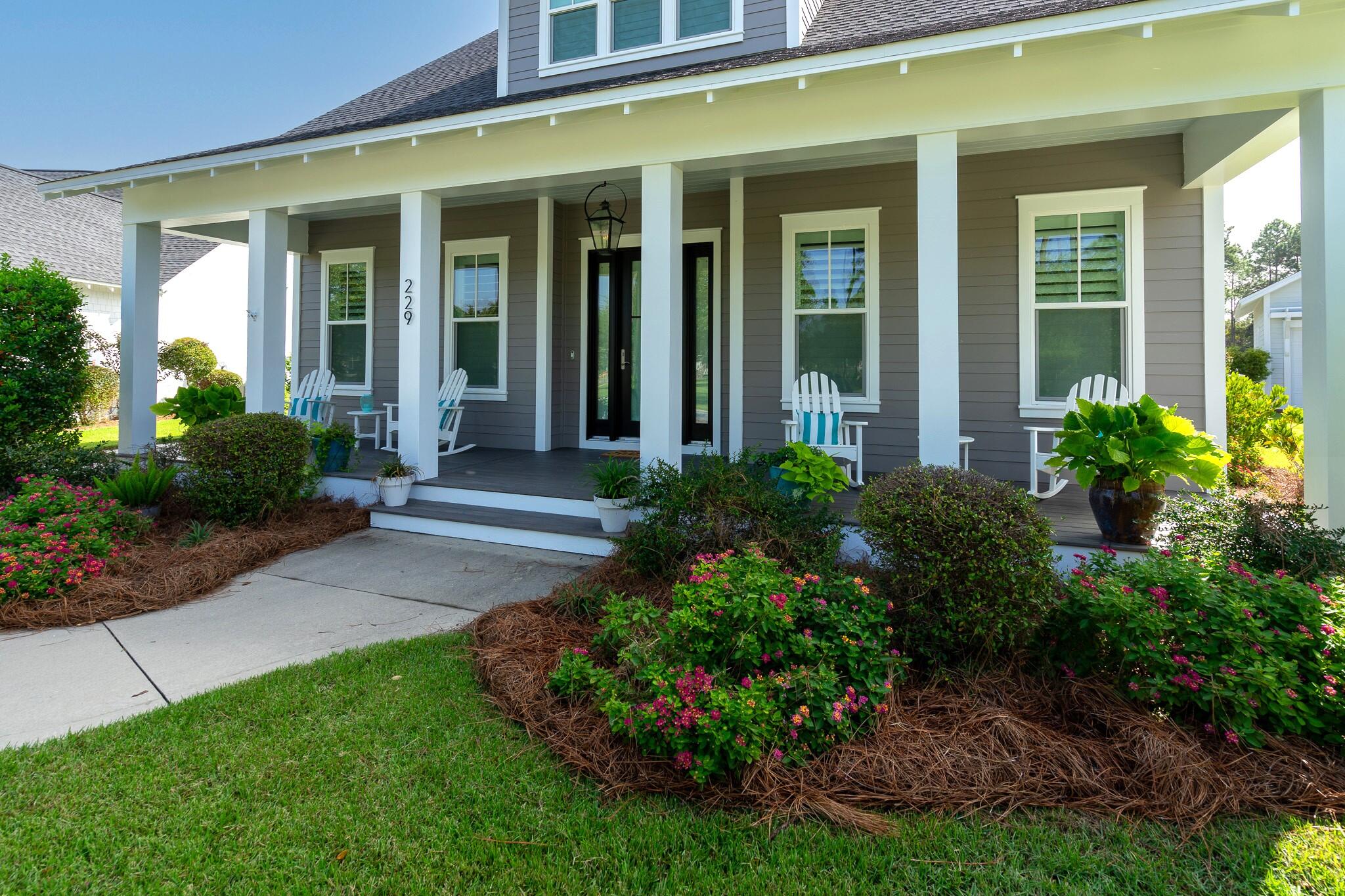 229 Sandchase Circle Inlet Beach, FL 32461 - Photo 2 of 61 front view of a house with a yard