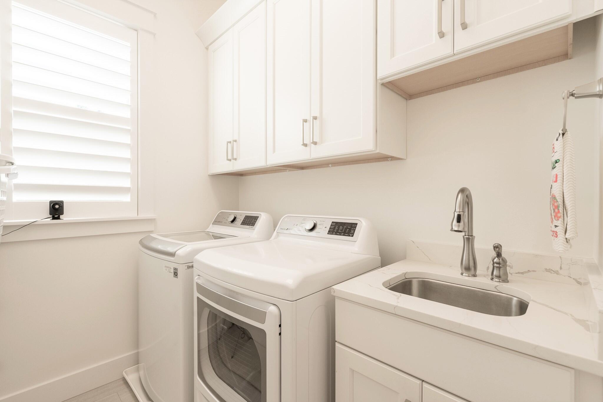 229 Sandchase Circle Inlet Beach, FL 32461 - Photo 26 of 61 a utility room with dryer and washer