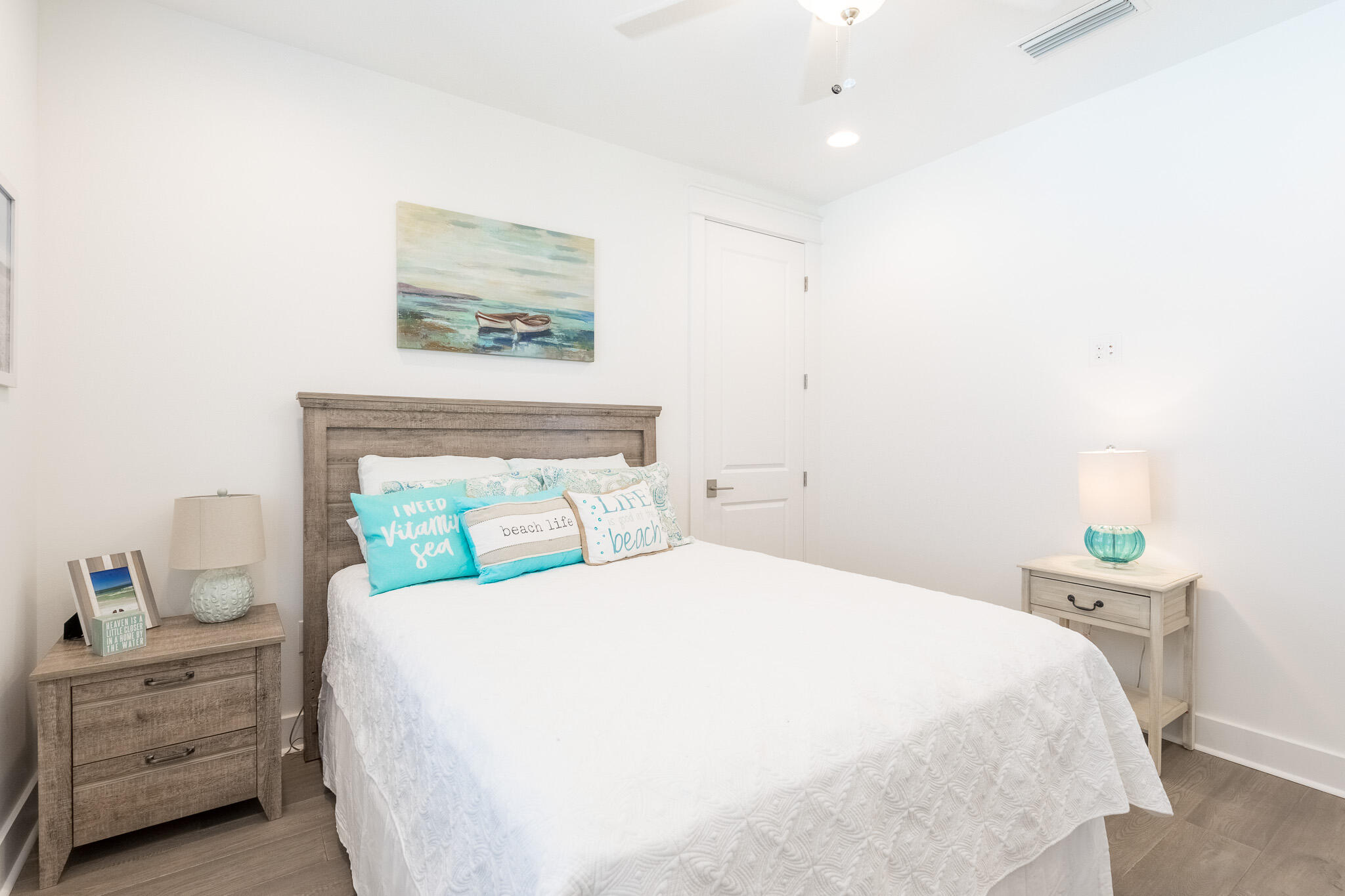 229 Sandchase Circle Inlet Beach, FL 32461 - Photo 32 of 61 a bedroom with a bed and a painting on the wall