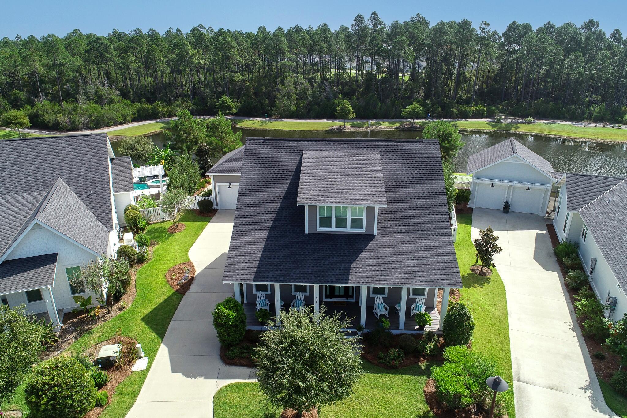229 Sandchase Circle Inlet Beach, FL 32461 - Photo 43 of 61 a aerial view of a house with a garden and plants