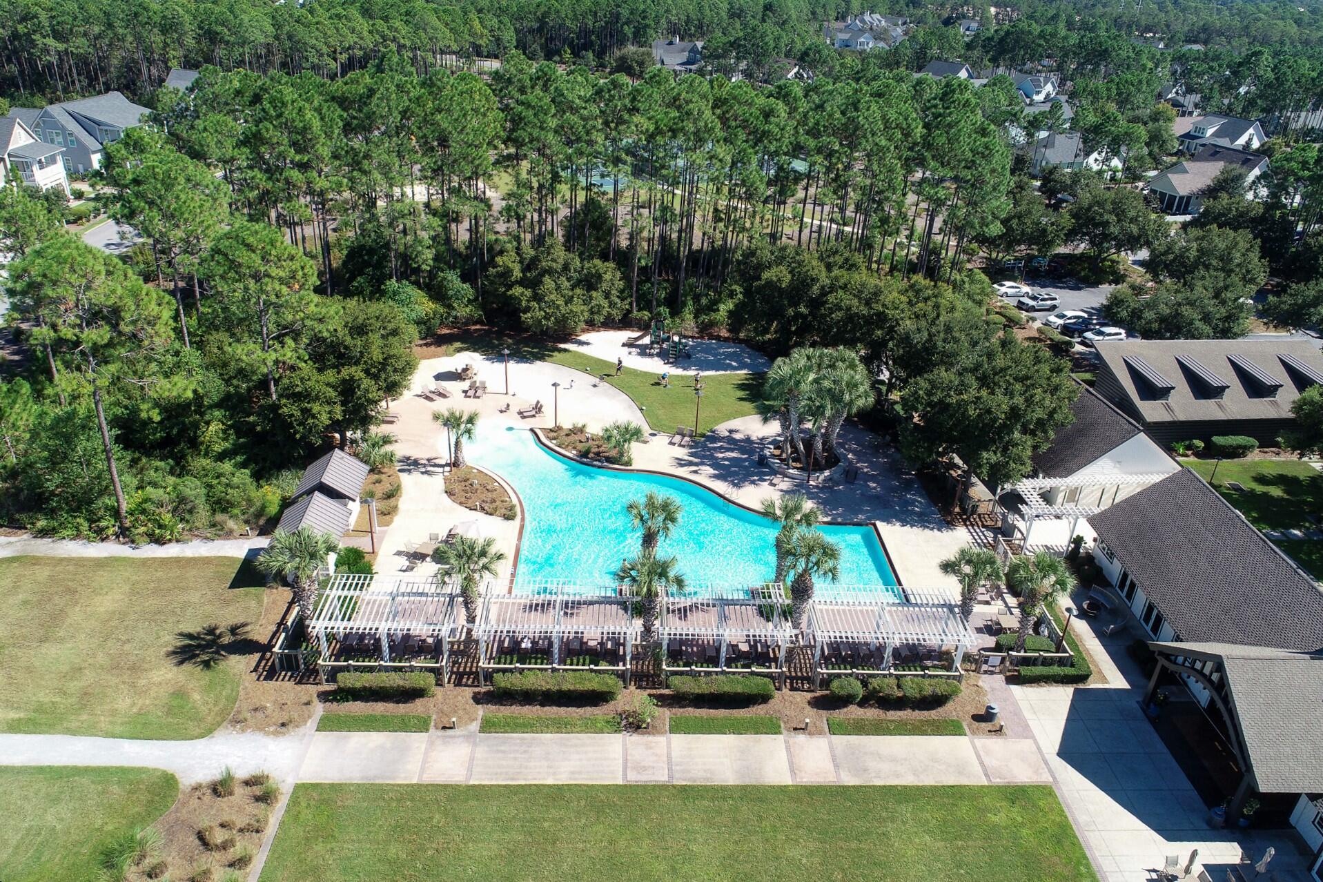 229 Sandchase Circle Inlet Beach, FL 32461 - Photo 51 of 61 an aerial view of a house with swimming pool patio and outdoor seating