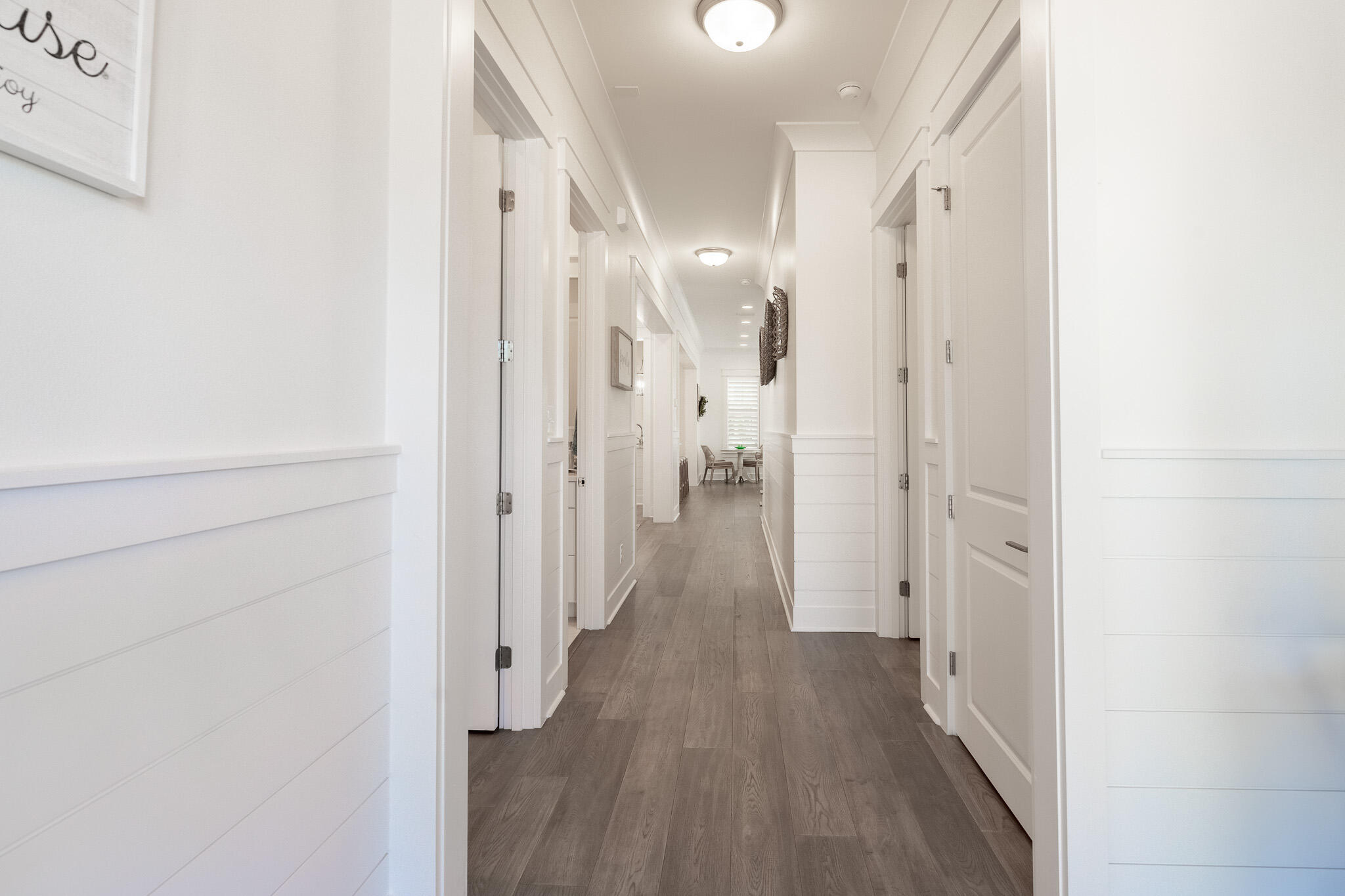 229 Sandchase Circle Inlet Beach, FL 32461 - Photo 10 of 61 a view of a hallway with wooden floor