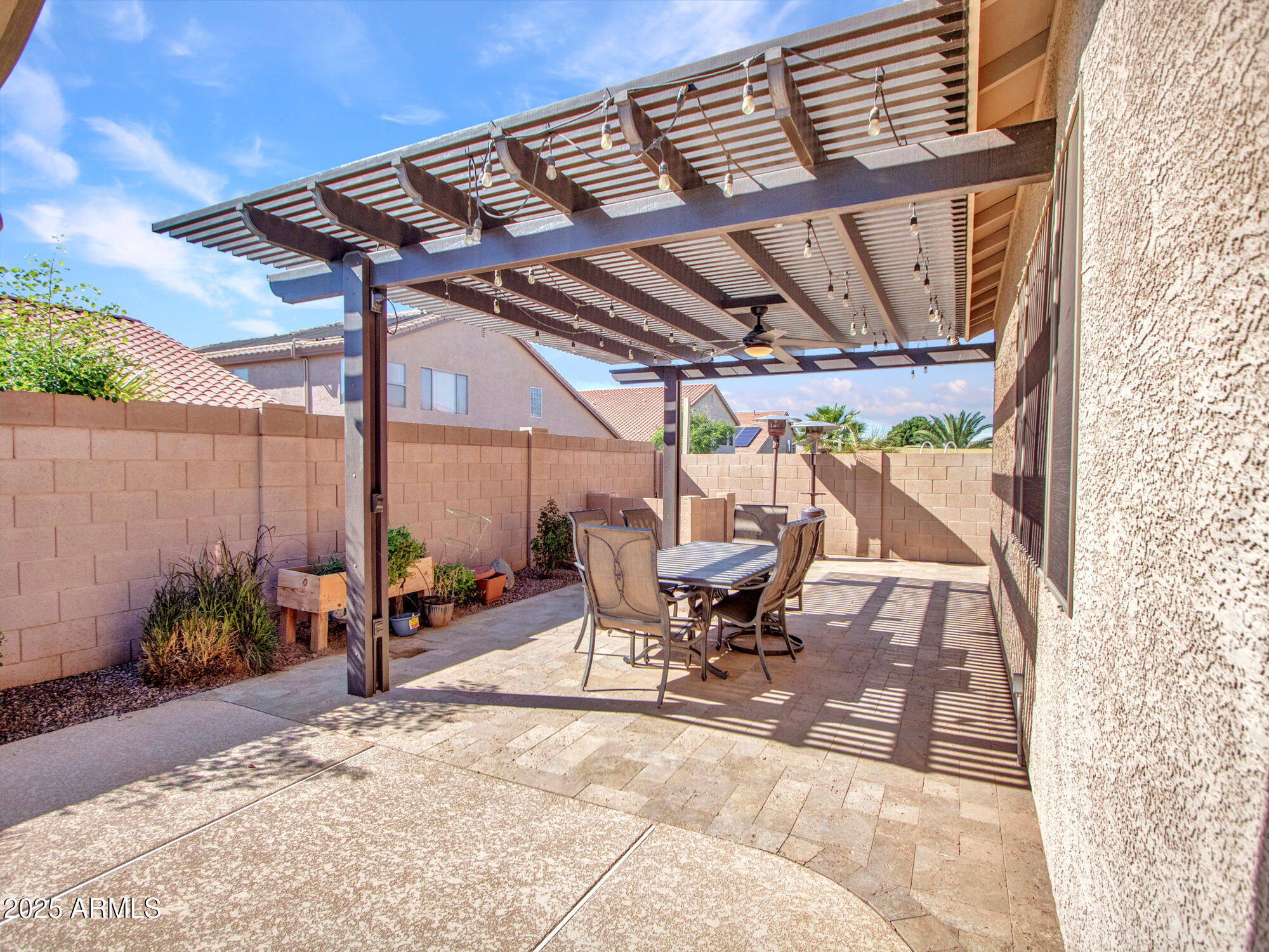 6919 West Rowel Road Peoria, AZ 85383 - Photo 36 of 74 a patio with table and chairs
