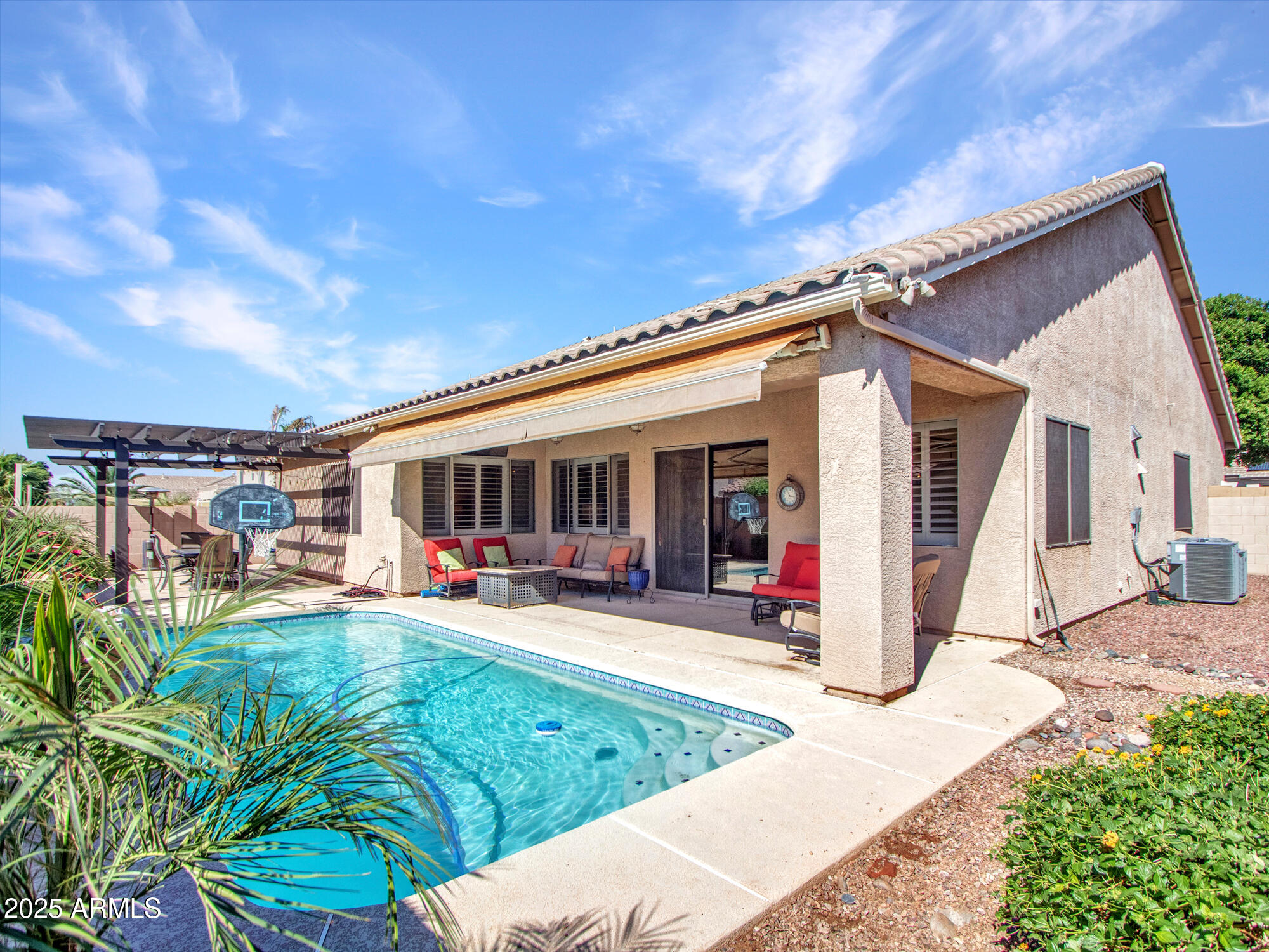 6919 West Rowel Road Peoria, AZ 85383 - Photo 40 of 74 a view of a house with patio