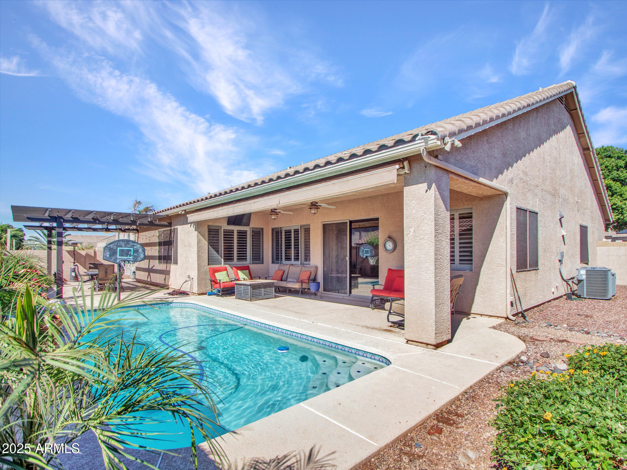 6919 West Rowel Road Peoria, AZ 85383 - Photo 41 of 74 a front view of a house with porch