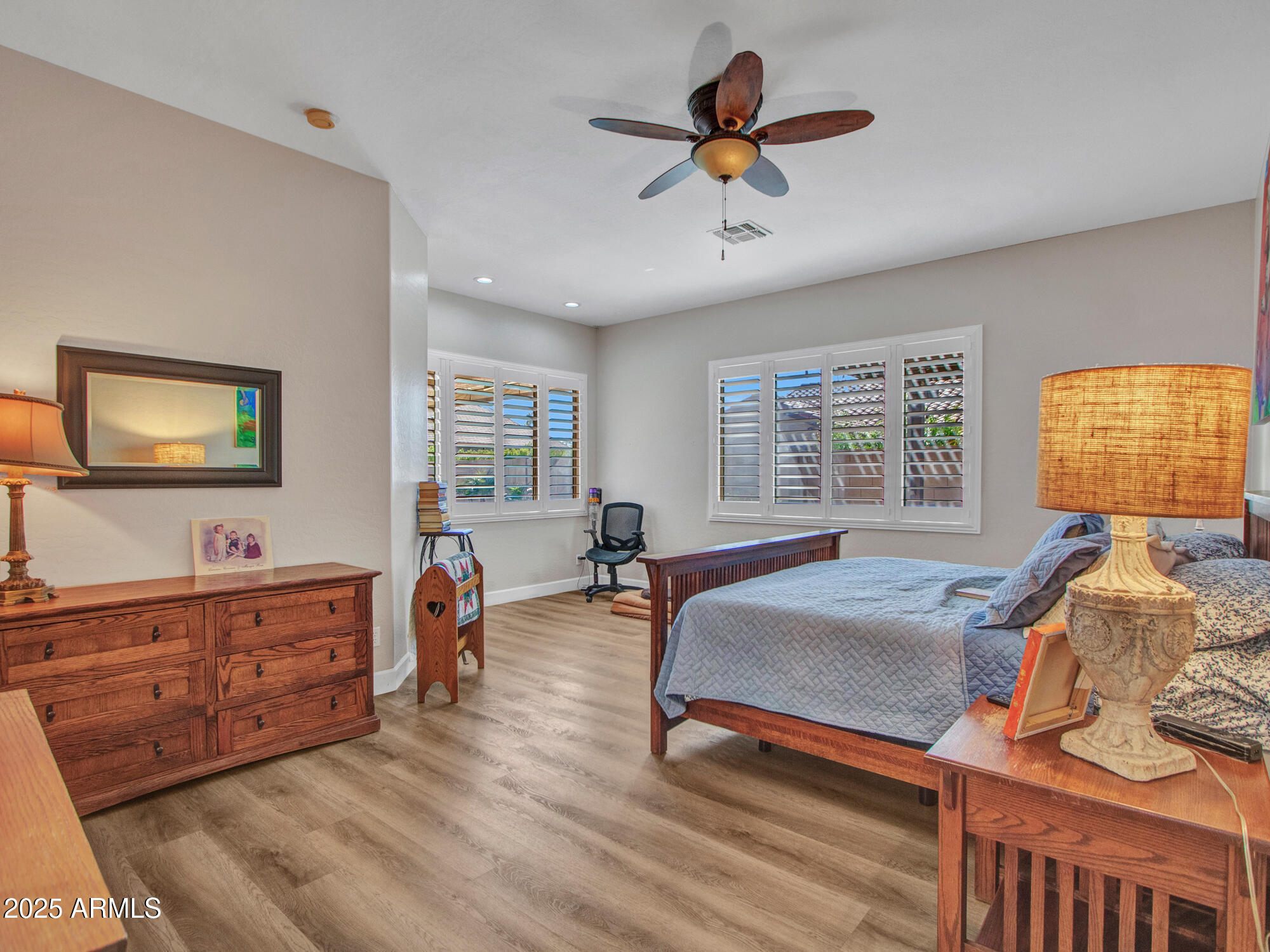6919 West Rowel Road Peoria, AZ 85383 - Photo 46 of 74 a living room with furniture and a flat screen tv
