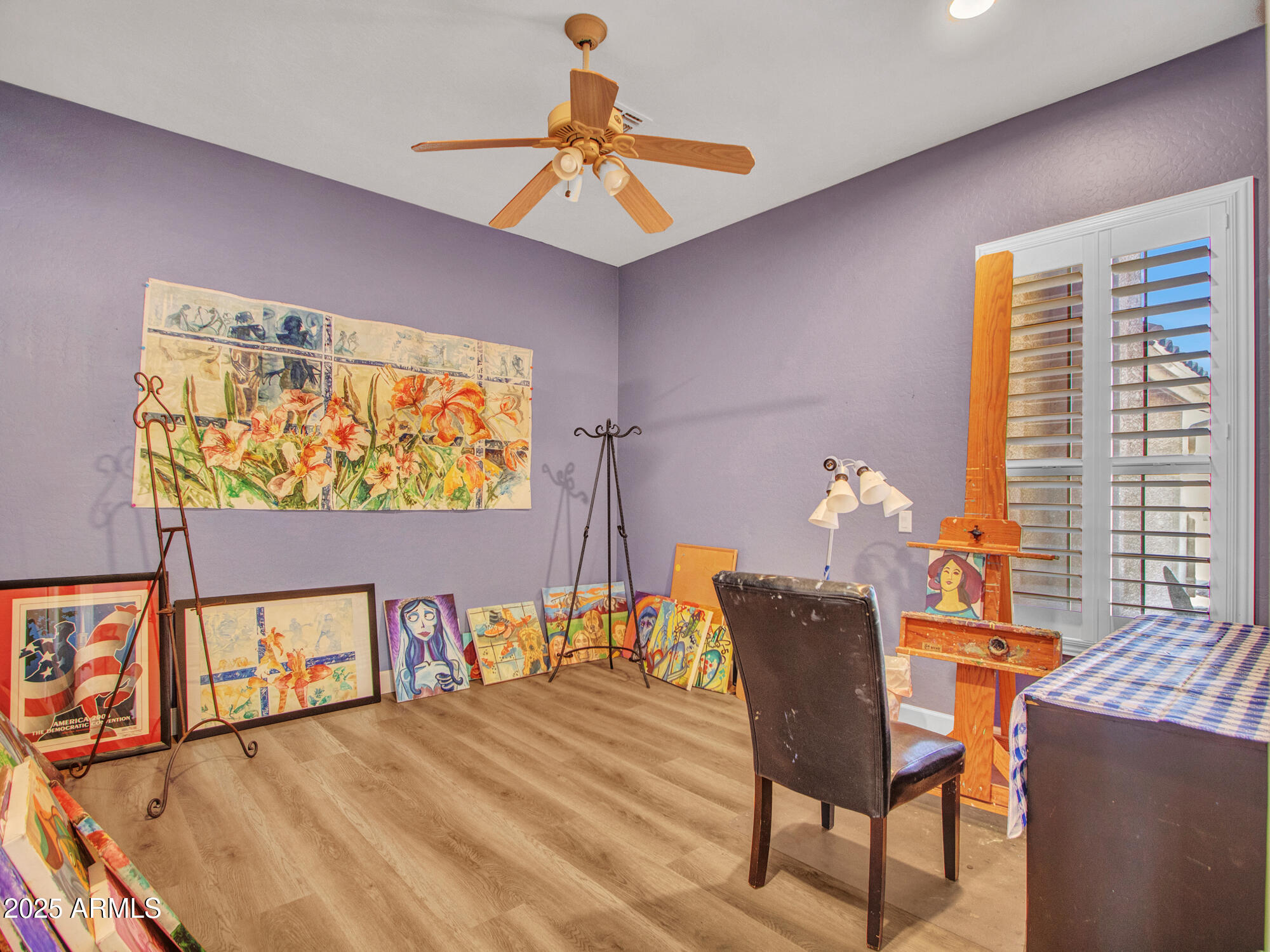 6919 West Rowel Road Peoria, AZ 85383 - Photo 53 of 74 a bedroom with furniture and a window