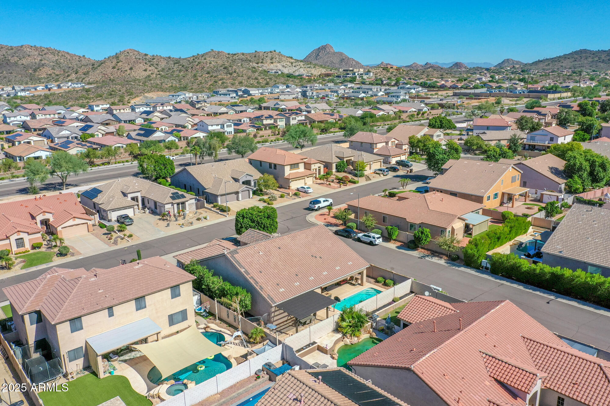 6919 West Rowel Road Peoria, AZ 85383 - Photo 67 of 74 an aerial view of a house with a mountain