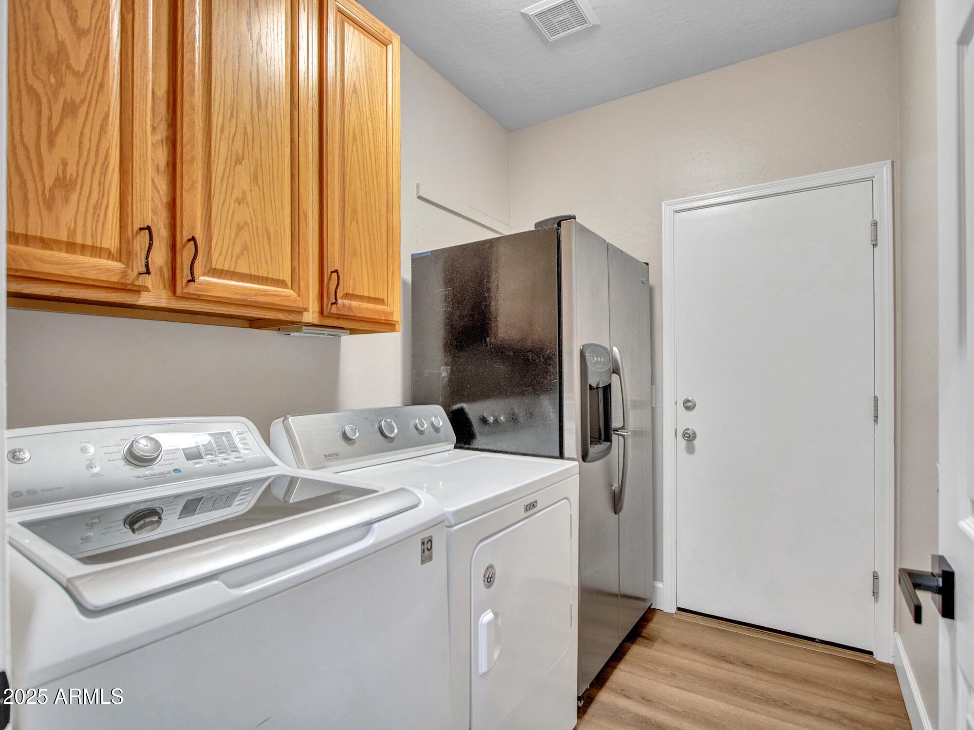 6919 West Rowel Road Peoria, AZ 85383 - Photo 72 of 74 a utility room with dryer and washer