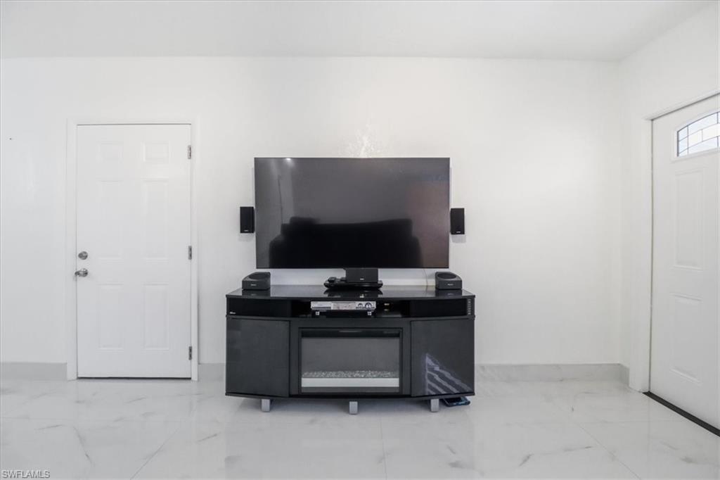 6800 Northwest 28th Avenue Miami, FL 33147 - Photo 10 of 40 Living room with light marble finish floors